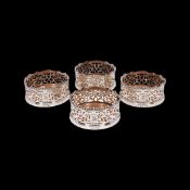 A FINE SET OF FOUR STERLING SILVER WINE COASTERS BY HENRY WILKINSON & CO, 1844
