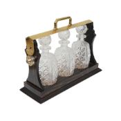 A LATE 19TH CENTURY CALAMANDER TANTALUS AND DECANTERS