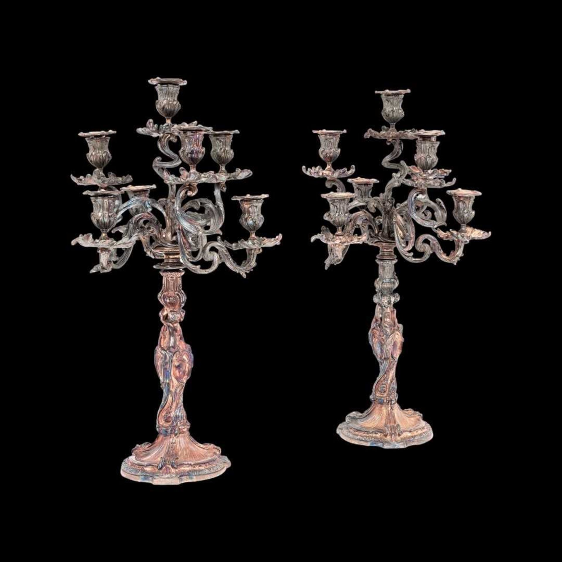 AFTER JUSTE-AURELE MEISSONNIER (1695-1750): A PAIR OF 19TH CENTURY SILVERED BRONZE CANDELABRA