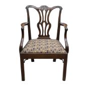 A GEORGE III MAHOGANY OPEN ARMCHAIR