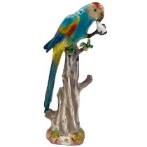 MEISSEN: A 19TH CENTURY PORCELAIN MODEL OF A PARROT EATING FRUIT