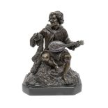 A FIRST HALF 19TH CENTURY BRONZE FIGURE OF A MANDOLIN PLAYER