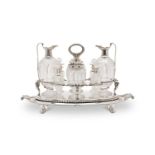 PAUL STORR: A STERLING SILVER AND GLASS GEORGE III PERIOD CRUET SET, 1806