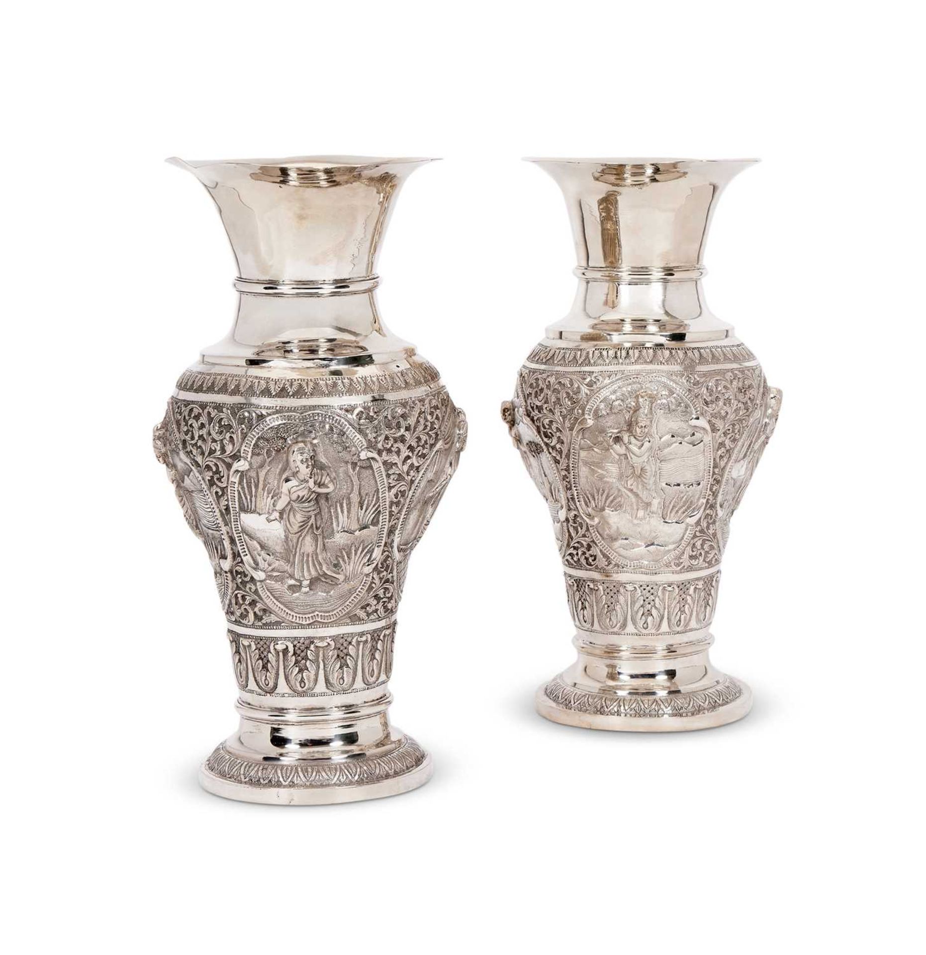 A PAIR OF LATE 19TH CENTURY INDIAN SILVER VASES