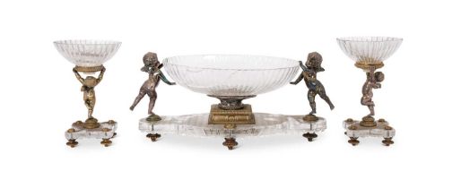 BACCARAT: A LATE 19TH CENTURY SILVERED BRONZE AND CUT GLASS THREE PIECE CENTREPIECE