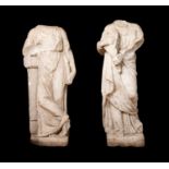 A PAIR OF 15TH CENTURY OR EARLIER ITALIAN MARBLE FIGURES OF MUSES CLIO AND TERPSICHORE