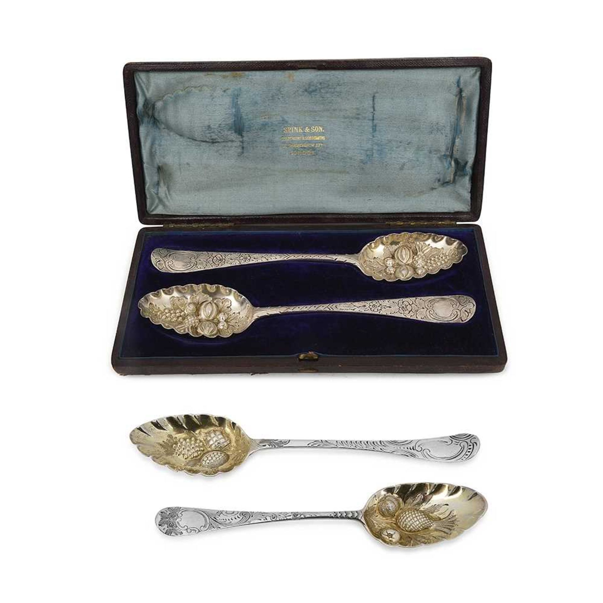 FOUR GEORGIAN SILVER AND SILVER GILT BERRY SPOONS