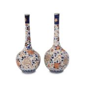 A PAIR OF 19TH CENTURY JAPANESE PORCELAIN BOTTLE SHAPED VASES