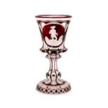 A 19TH CENTURY BOHEMIAN FLASHED RUBY AND ETCHED AND CUT GLASS GOBLET CIRCA 1860