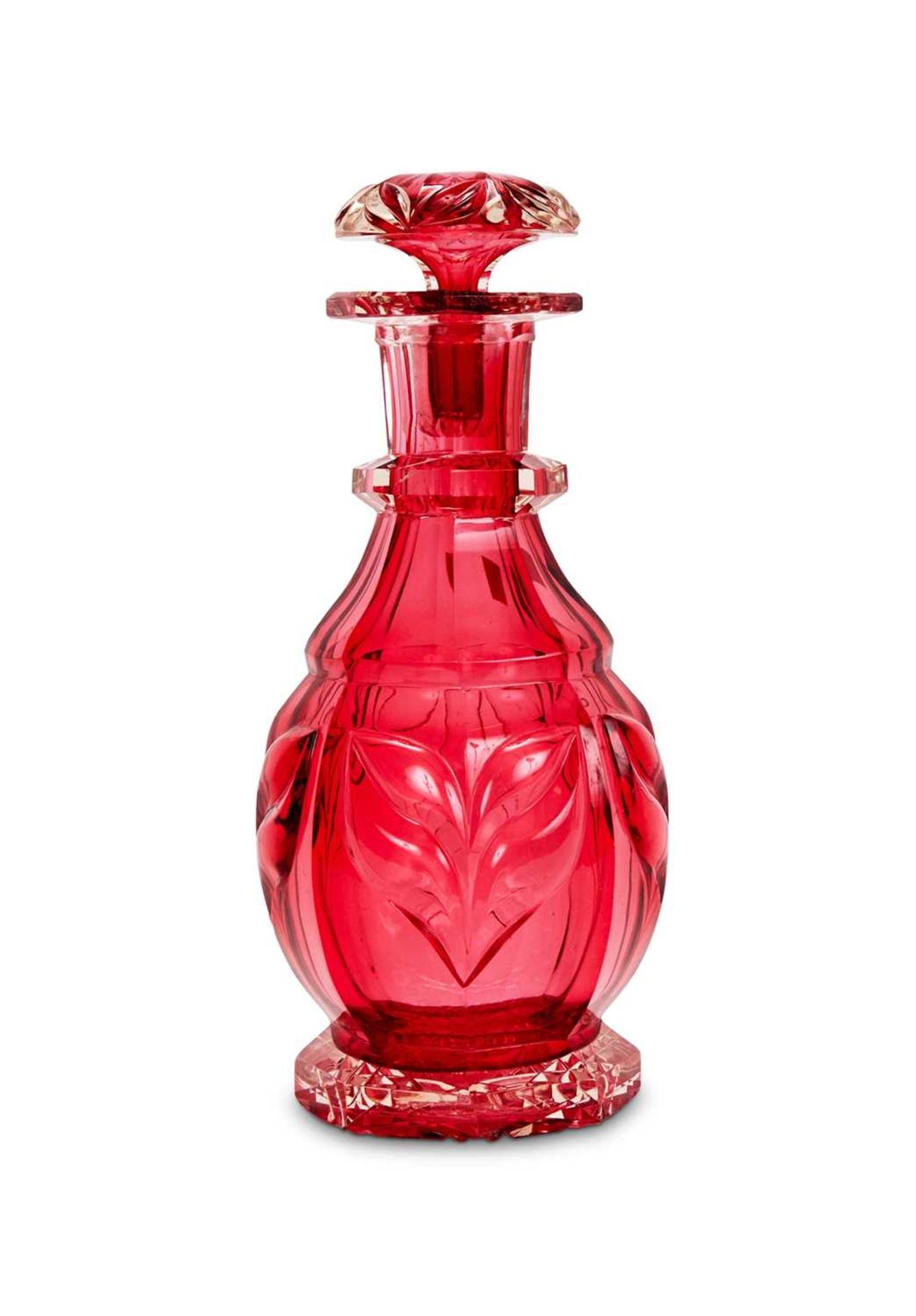 A LATE 19TH CENTURY RUBY CUT GLASS DECANTER ATTRIBUTED TO STEVENS AND WILLIAMS