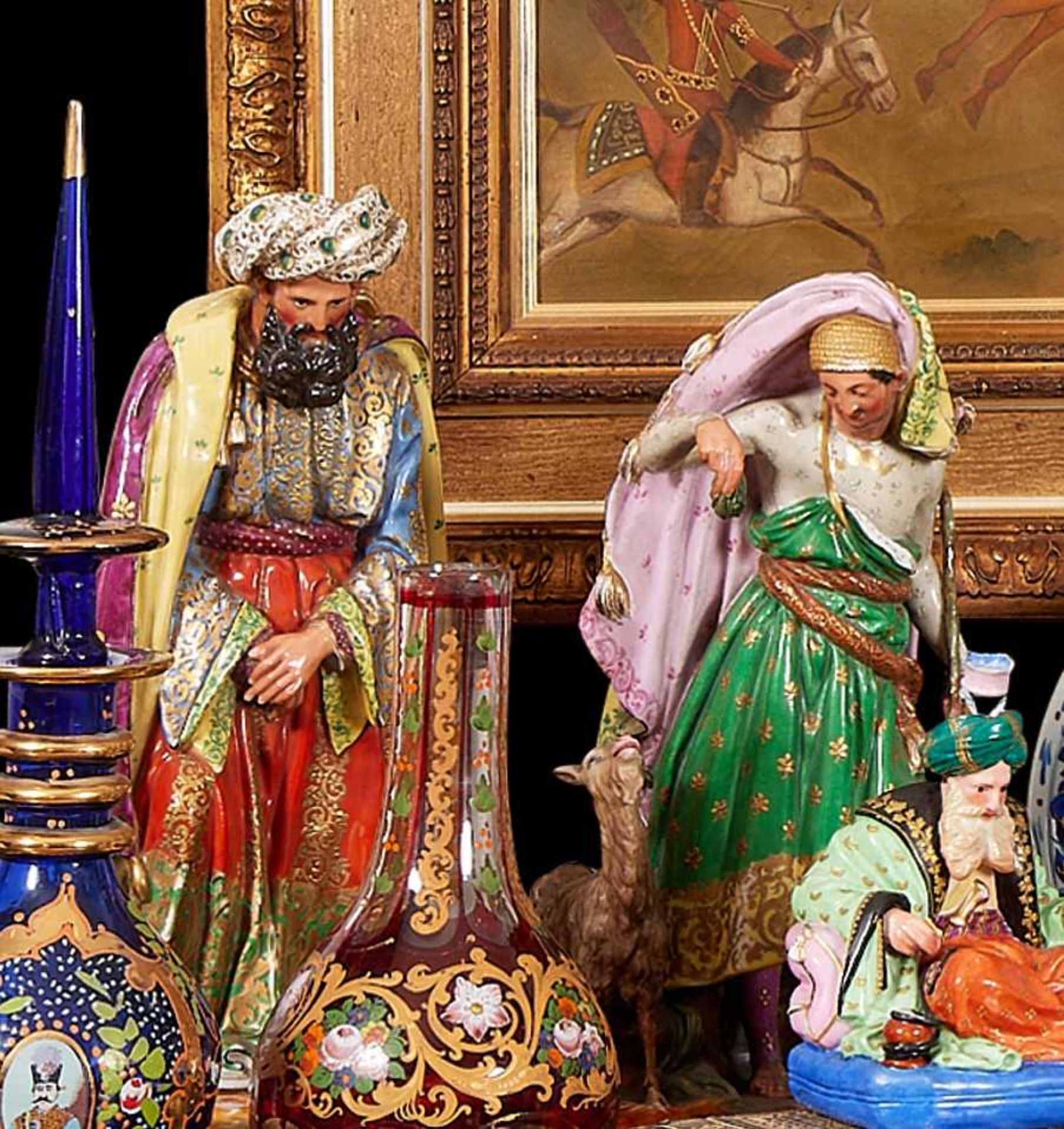 A PAIR OF MID 19TH CENTURY PARIS PORCELAIN PERFUME BOTTLES IN THE FORM OF A SULTAN AND HIS ATTENDANT