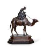 MANNER OF ANTOINE-LOUIS BARYE (FRENCH, 1795-1875) : A LARGE BRONZE GROUP OF AN ARAB BOY AND CAMEL