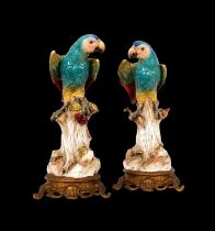 A RARE PAIR OF 19TH CENTURY MEISSEN PORCELAIN MODELS OF PARROTS