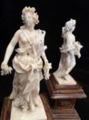 H.R.H PRINCESS MARGARET'S WEDDING GIFT: A PAIR OF 18TH CENTURY IVORY FIGURES OF SPRING AND AUTUMN