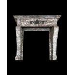 A 19TH CENTURY BRECCIA MARBLE CHIMNEYPIECE