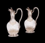 TETARD FRERES: A FINE PAIR OF 19TH CENTURY SILVER AND CRYSTAL GLASS CLARET JUGS CIRCA 1880