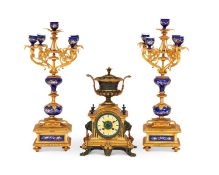 A LATE 19TH CENTURY BRONZE CLOCK GARNITURE IN THE STYLE OF BARBEDIENNE