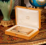 AN ANTIQUE RUSSIAN 14 CARAT SOLID GOLD AND SAPPHIRE MOUNTED CIGARETTE CASE