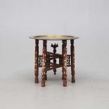 A NORTH AFRICAN MOTHER OF PEARL AND BRASS FOLDING BENARES TABLE