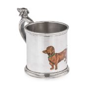 CARTIER: A FINE ANTIQUE STERLING SILVER AND ENAMEL GLASS HOLDER OF DOG THEME