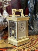 A LATE 19TH CENTURY FRENCH MINIATURE GILT BRASS CARRIAGE CLOCK