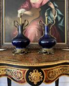 A PAIR OF EARLY 20TH CENTURY ORMOLU MOUNTED VASE LAMP BASES