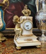 A LATE 19TH CENTURY FRENCH GILT BRONZE AND WHITE MARBLE MANTEL CLOCK