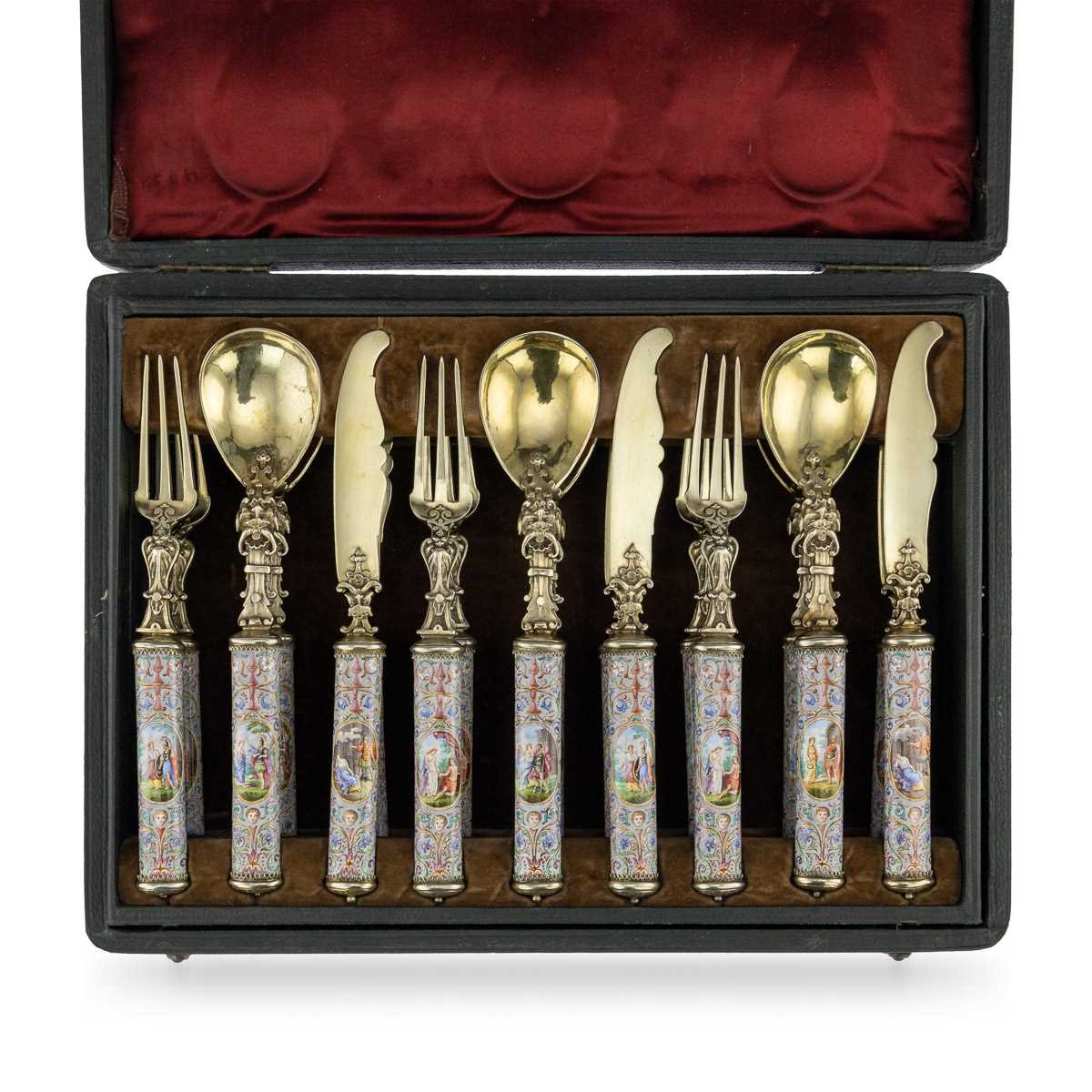 A FINE SOLID SILVER GILT AND ENAMEL CUTLERY SET BY HERMANN RATZERSDORFER, VIENNA C. 1880