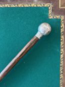 GOLFING INTEREST: A 19TH CENTURY SILVER TOPPED CANE, LONDON, 1885