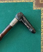 A LATE 19TH CENTURY WALKING CANE WITH EROTIC HANDLE