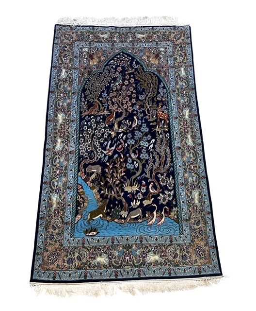 A PART SILK ISFAHAN CARPET OF ANIMAL DESIGN, NORTH WEST PERSIA