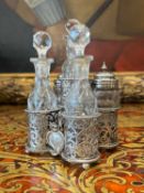 A STERLING SILVER AND CUT GLASS VICTORIAN CRUET SET, LONDON 1861 BY GEORGE FOX