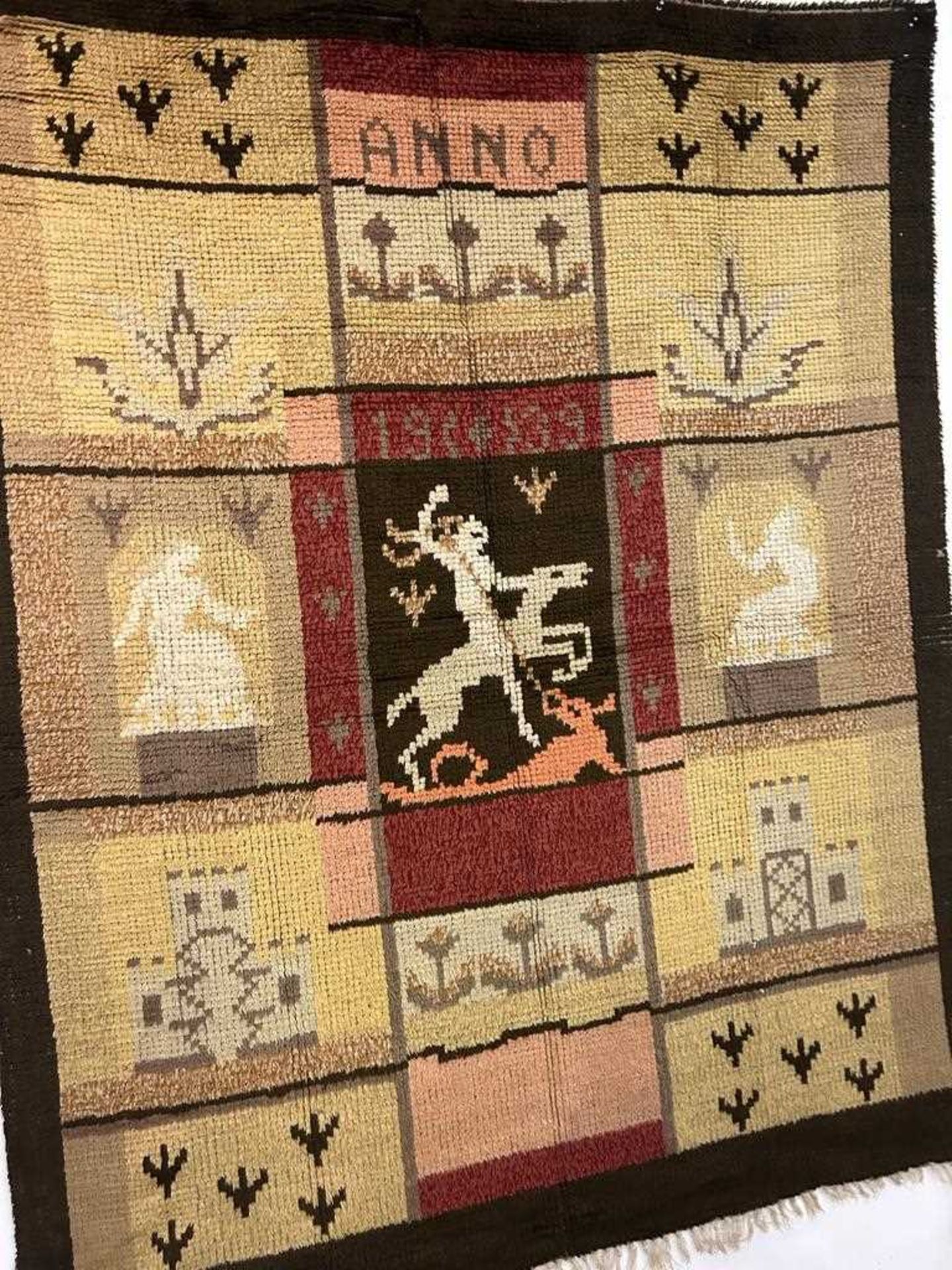 A 1930'S SCANDINAVIAN WOOL PILE RUG DEPICTING ST GEORGE AND THE DRAGON, DATED 1939 - Image 2 of 8