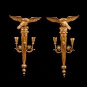 A PAIR OF 19TH CENTURY GILTWOOD WALL SCONCES DECORATED WITH EAGLES