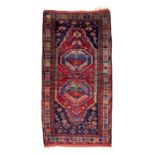 AN EARLY 20TH CENTURY KURDISTAN RUG