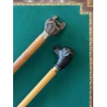TWO NOVELTY WALKING CANES WITH DOG HEAD HANDLES