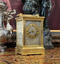 A FINE LATE 19TH CENTURY FRENCH CARRIAGE CLOCK WITH SIILVERED ENGRAVED PANELS