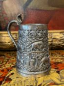 A 19TH CENTURY INDIAN SILVERED METAL TANKARD