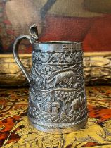 A 19TH CENTURY INDIAN SILVERED METAL TANKARD