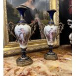 A PAIR OF LATE 19TH CENTURY SEVRES STYLE PORCELAIN AND ORMOLU MOUNTED VASES