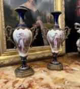 A PAIR OF LATE 19TH CENTURY SEVRES STYLE PORCELAIN AND ORMOLU MOUNTED VASES