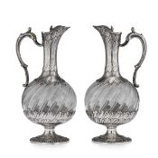 MAISON ODIOT: A PAIR OF 19TH CENTURY SILVER AND GLASS CLARET JUGS CIRCA 1890