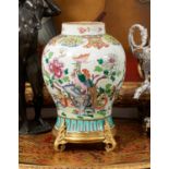 AN 18TH CENTURY CHINESE PORCELAIN VASE WITH FRENCH ORMOLU MOUNTS
