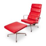 AN EAMES RED LEATHER SOFT PAD CHAIR WITH MATCHING STOOL