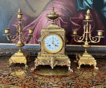 A LATE 19TH CENTURY FRENCH GILT BRONZE CLOCK GARNITURE