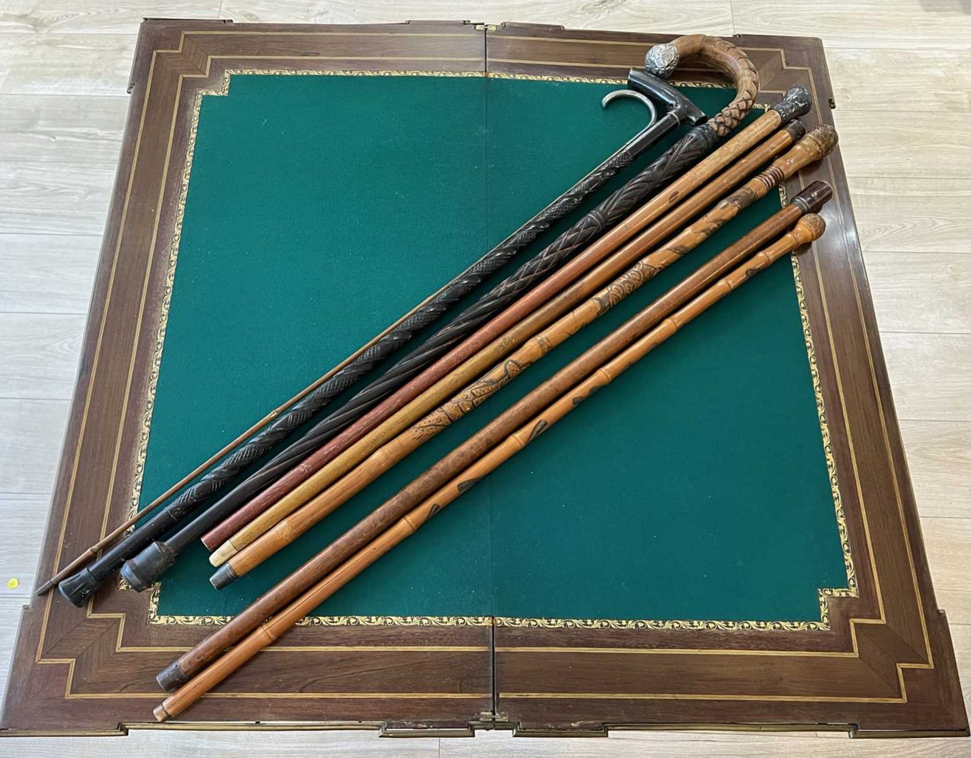 A GROUP OF EIGHT 19TH CENTURY WALKING CANES AND STICKS - Image 2 of 6
