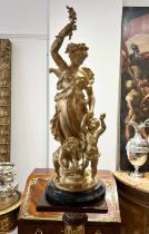 A LARGE GILT METAL FIGURAL GROUP OF A CLASSIC MAIDEN AND CHERUBS