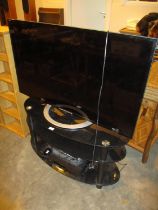 Sony 47in TV, Sky Decoder, Samsung DVD/VCR, Glass Stand and Remotes