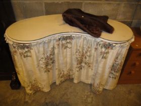 Kidney Shape Dressing Table and a Fur Stole
