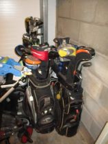 Various Golf Bags and Clubs